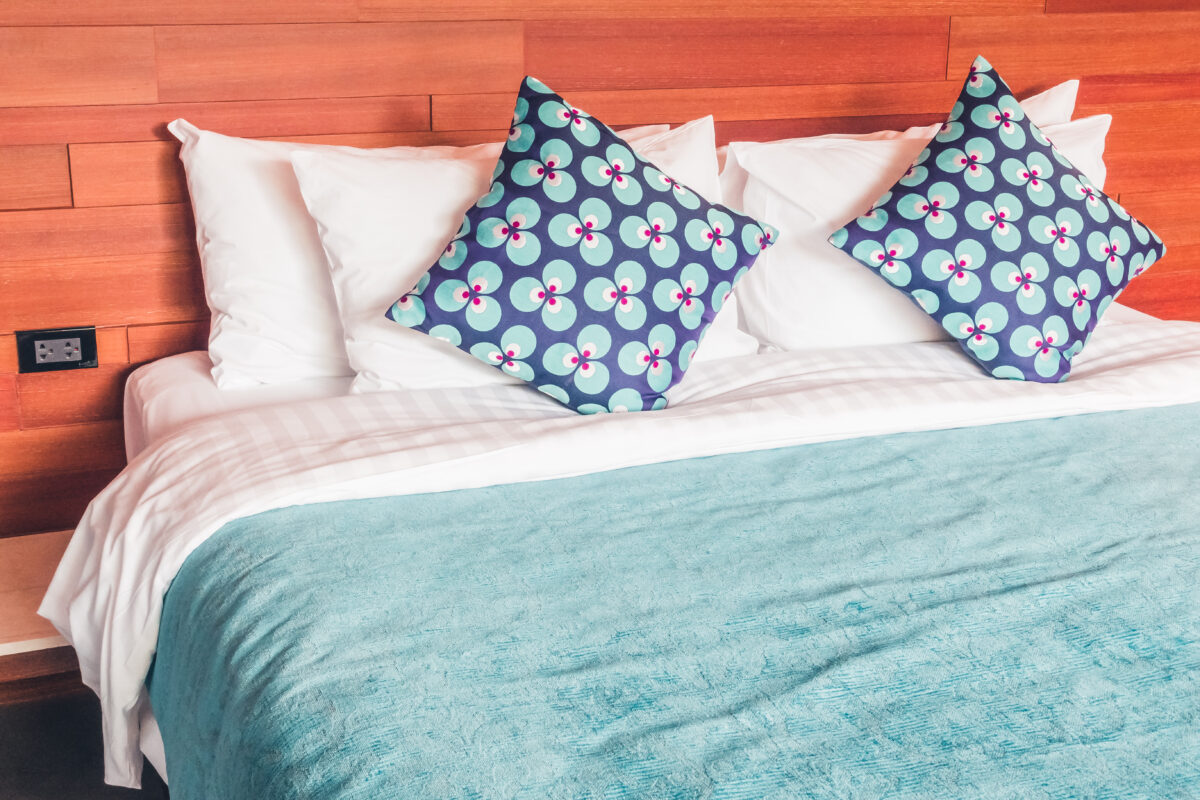 Beautiful luxury Pillow on bed decoration of bedroom interior - Vintage Film filter